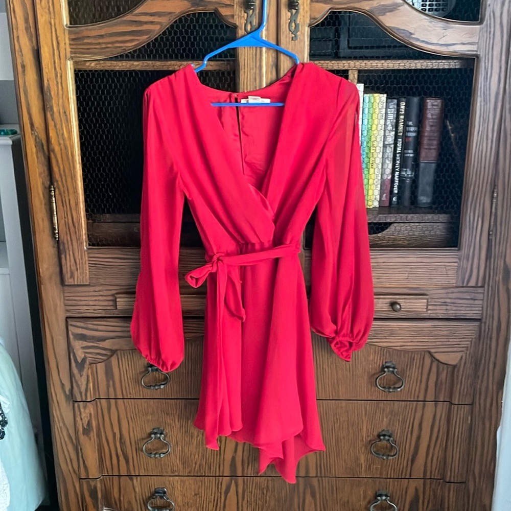 Long sleeve red asymmetrical dress with tie at waist